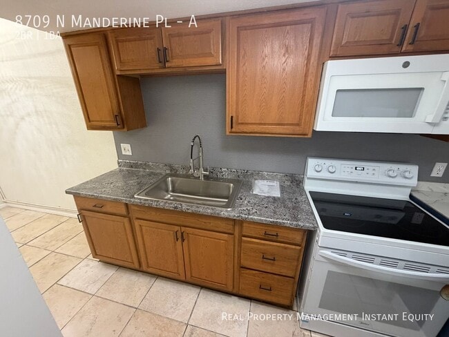 Building Photo - 8709 N Mandarine Pl