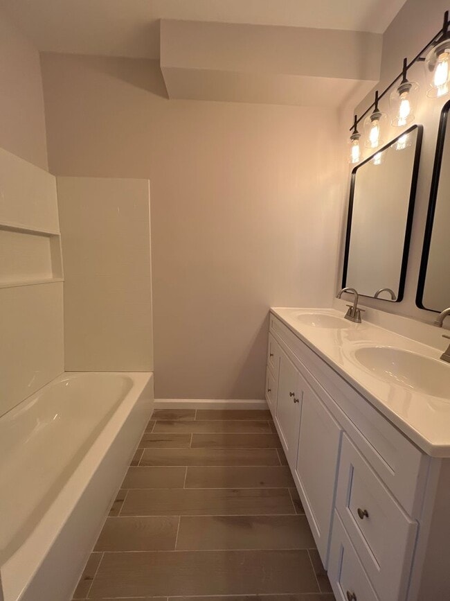 Building Photo - A real stunner! The full renovation is the first thing you'll notice..