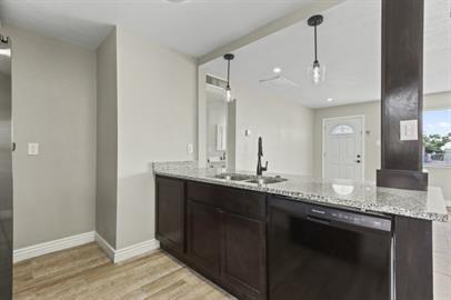 Building Photo - 3 bedrooms 1 bathroom with all tile flooring