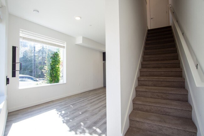 Building Photo - INCREDIBLE SPECIALS: Stylish 2-Bedroom Tow...