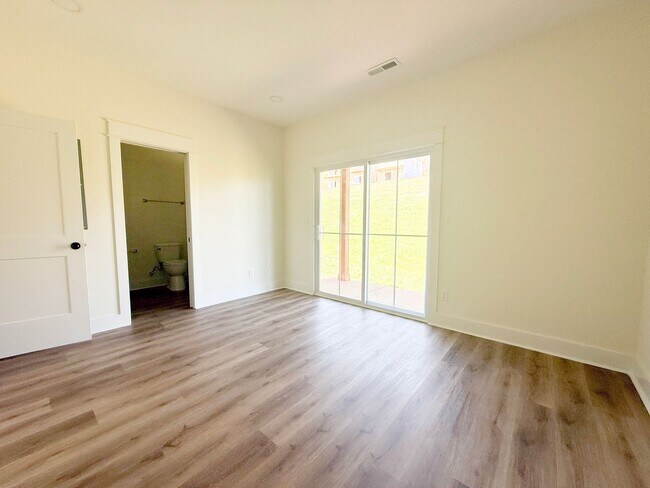 Building Photo - Tristan Style 3-Bedroom w/ Flex Room + Summer Special