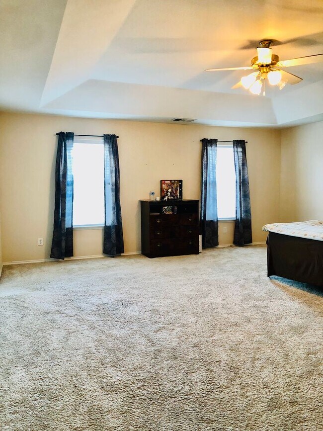 Building Photo - Coming Soon Spacious 4-Bedroom Home for Re...