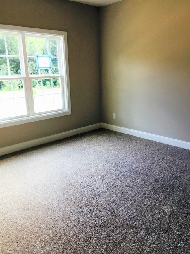 Building Photo - DESIRABLE Burkitt Community