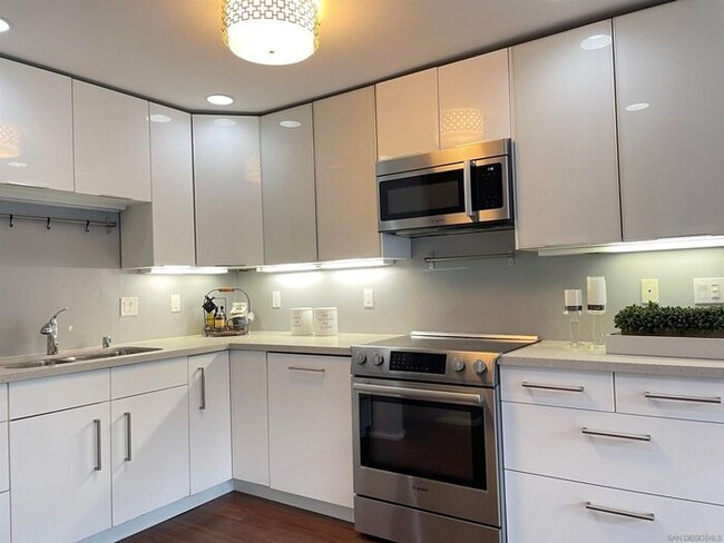 Building Photo - Updated Gated Condo with Pool Access Near SDSU & Shopping