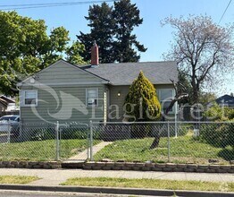 Building Photo - Three Bedroom, Two Bathroom House Located ...