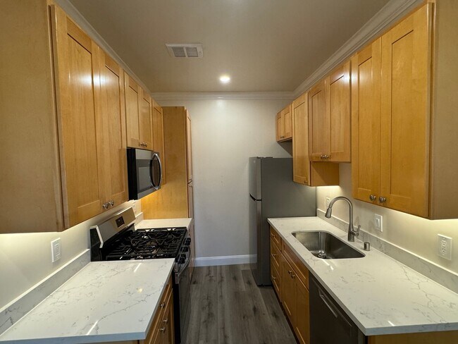 Building Photo - Newly Remodeled 3 Room Studio Apartment