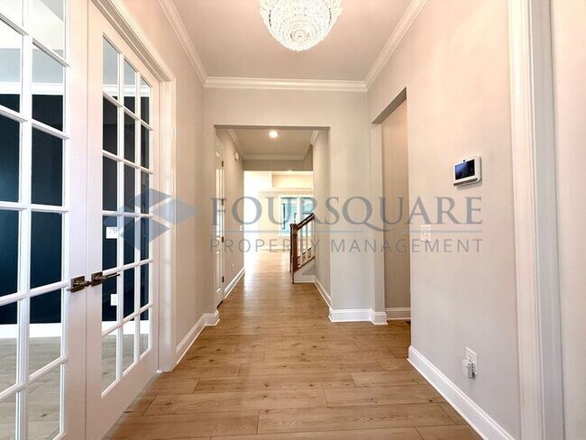 Building Photo - Elegant 4-Bed / 3.5-Bath Home with Main-Level Primary Suite, Quartz Kitchen & 3-Car Garage – In H...