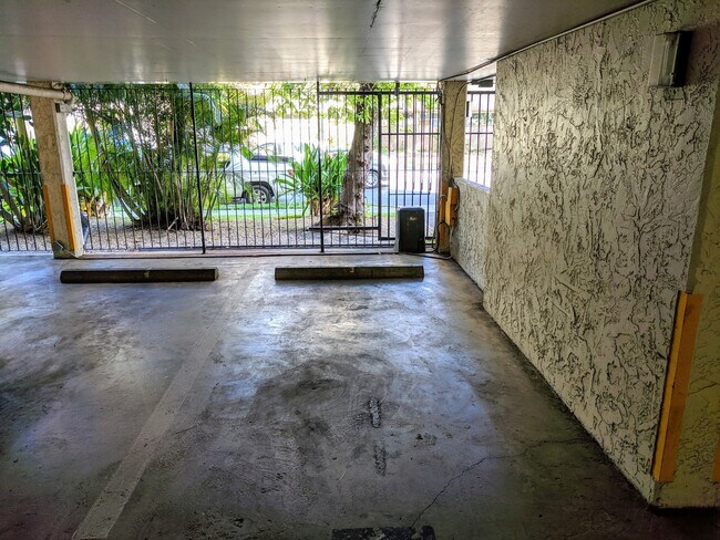 Building Photo - Sweeping Views from this partially furnished 1 Bed 1 Bath Condo w/ 1 Covered Parking