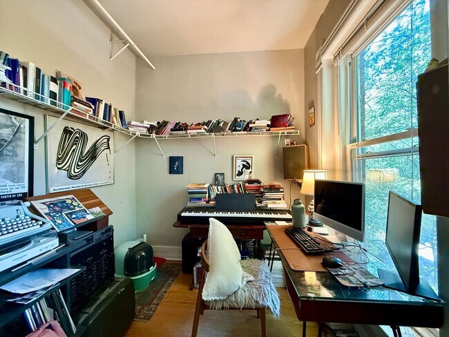 Building Photo - Amazing 2 Bedroom + Den. Separate Living/Dining Room. Large Deck. Lots of Natural Light.