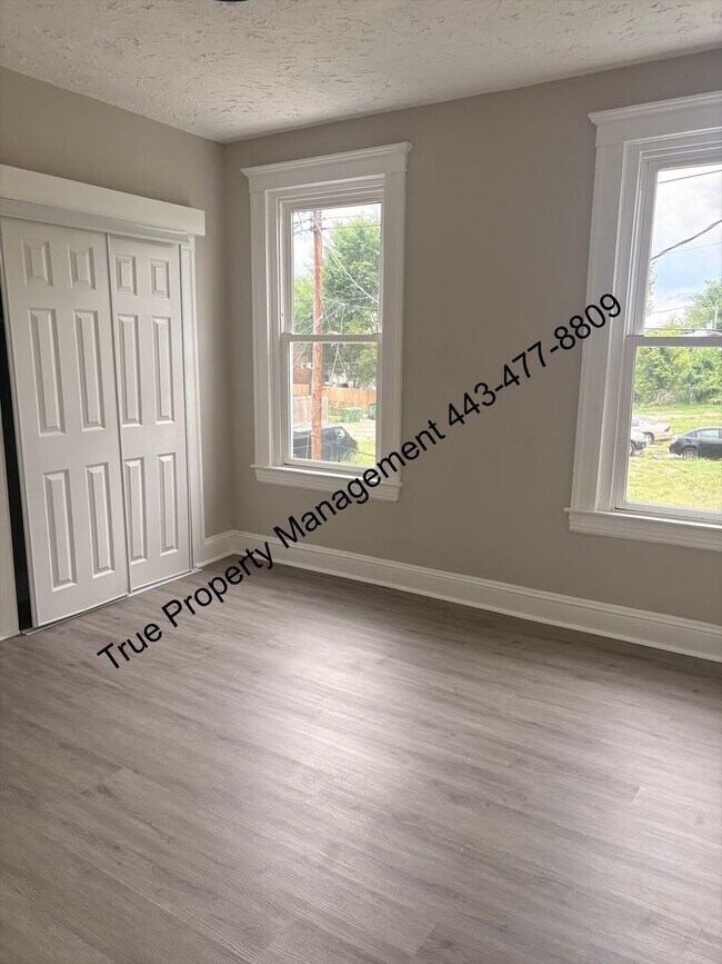 Building Photo - Spacious 3BR Home with Washer & Dryer, Backyard & Basement – $1,500/Month