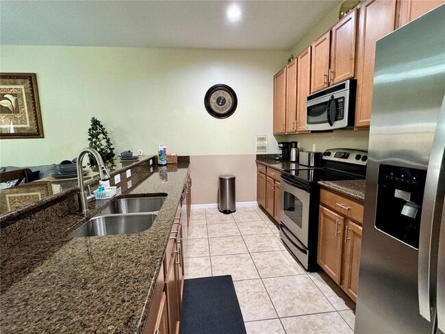 Building Photo - 8977 Coco Palm Rd