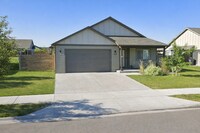 Building Photo - $500 OFF First Month's Rent! Spacious 3BR/2BA Home in Quiet Belgrade Neighborhood with Fenced Bac...