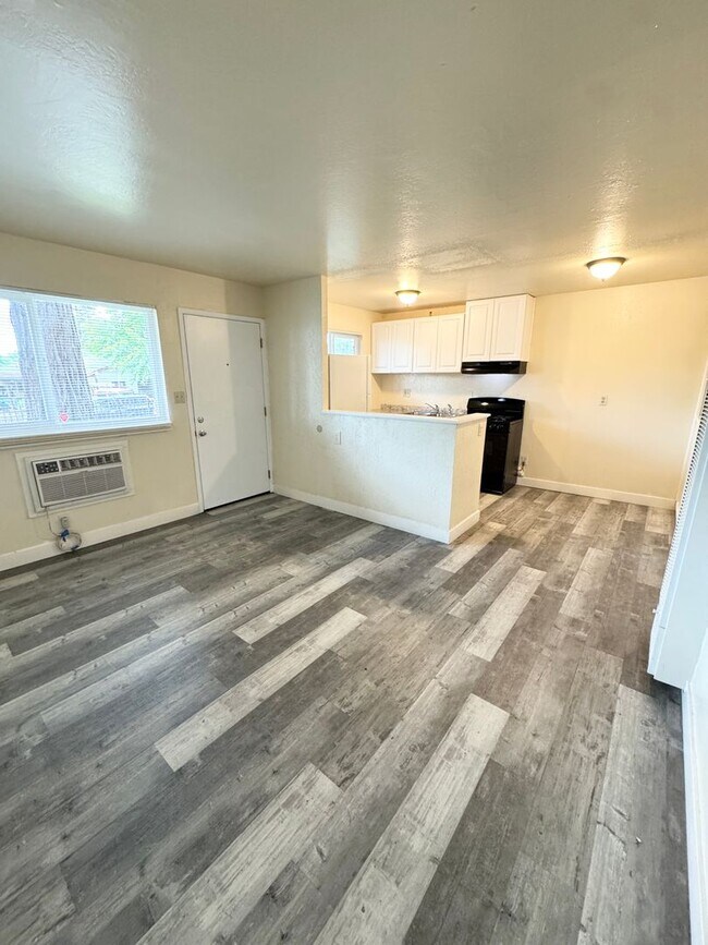 Building Photo - Move-In Special; Downstairs One Bedroom + Private Patio – Available Now! SEE VIDEO
