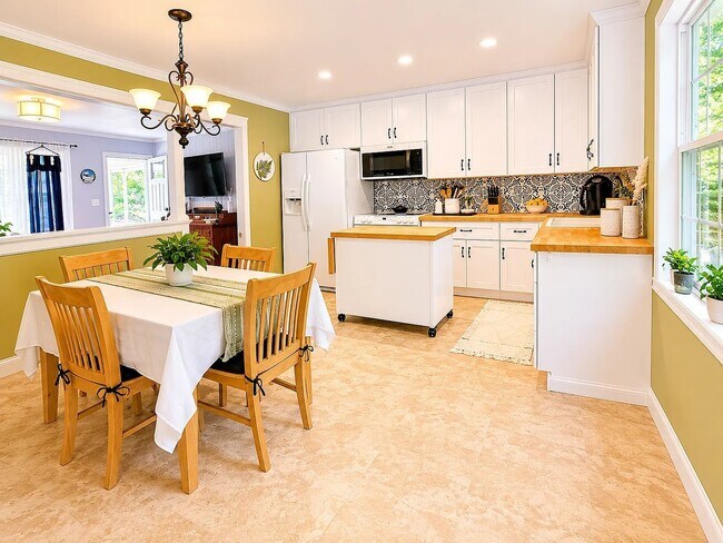 Building Photo - Dog-Friendly Updated Brick Rancher with Large Shaded Backyard