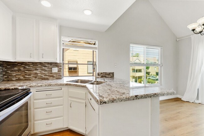 Building Photo - Top-Floor Condo in UTC – Updated and Move-...
