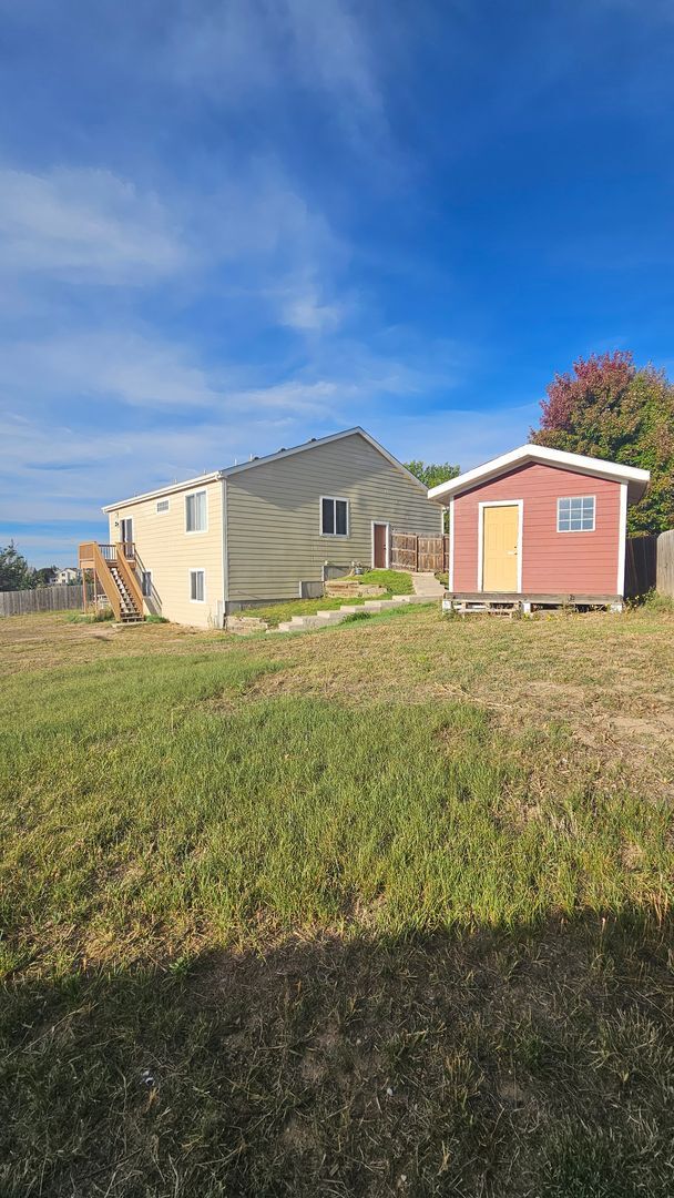 Building Photo - $2700 | 4BR/2.5BA | Pet Friendly House wit...