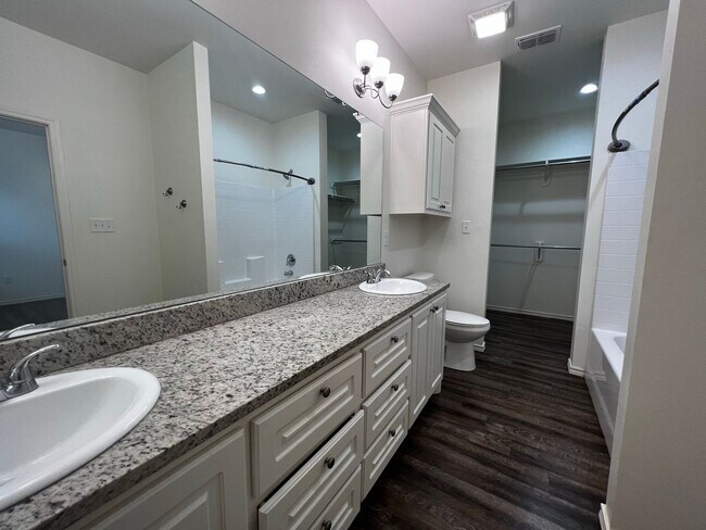 Building Photo - JULY PRE-LEASE! Spacious Townhome