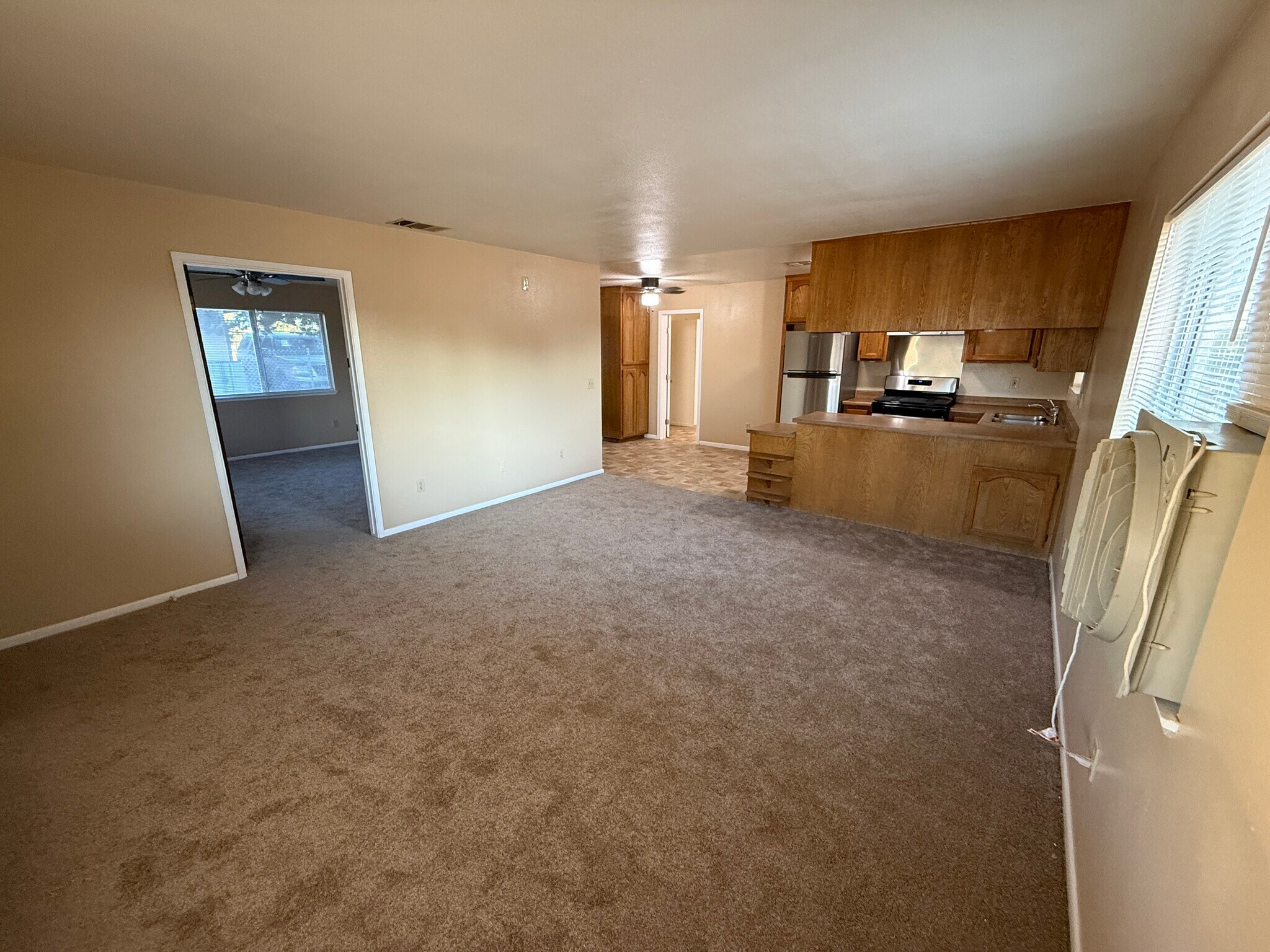 Living room and kitchen - 15936 Lime St