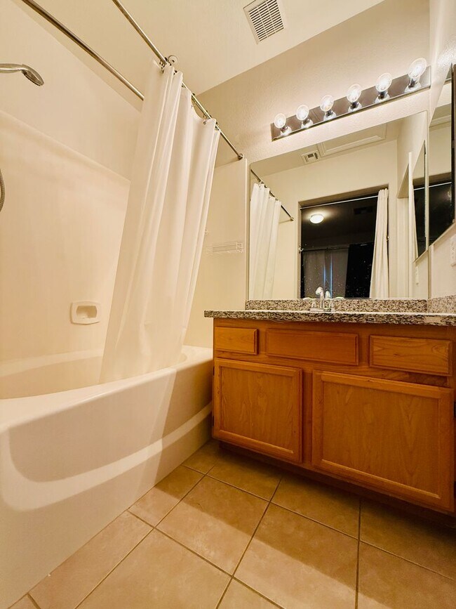 Building Photo - Immaculate and Inviting Two-Story Condo in Lone Mountain Available! 1/2 OFF THE FIRST FULL MONTH'...