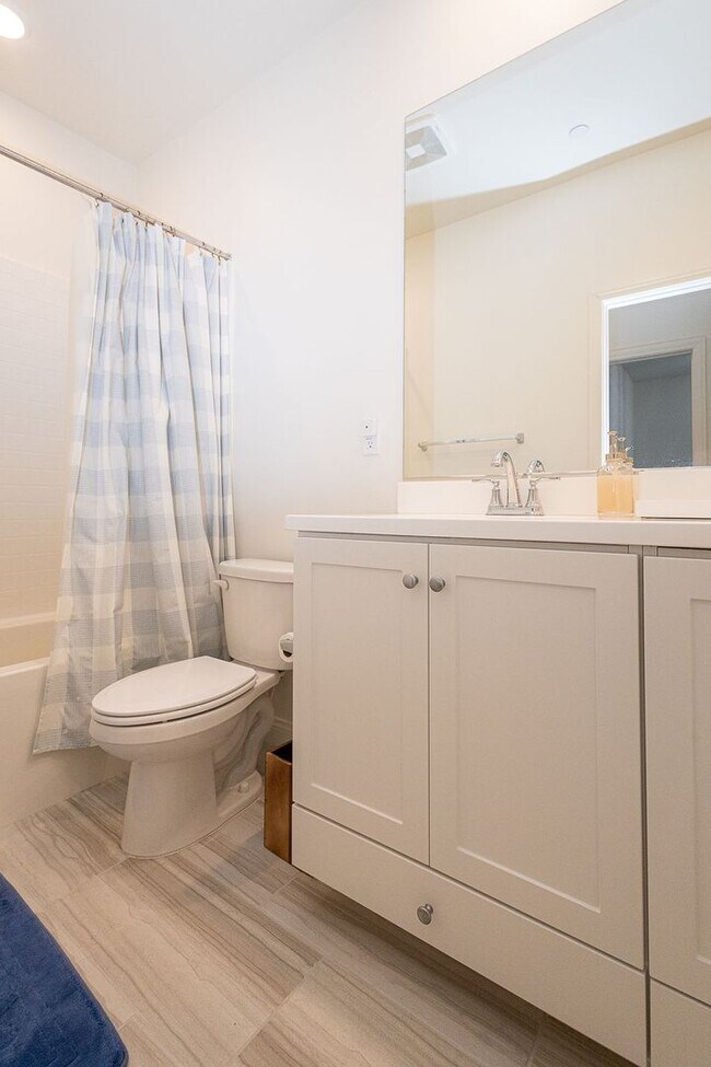 Building Photo - Bright and Airy Split-Level Townhouse in W...