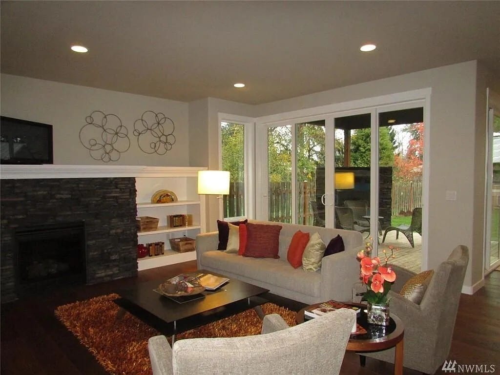 Living room that also has an entrance to the covered patio. - 15828 25th Ave NE