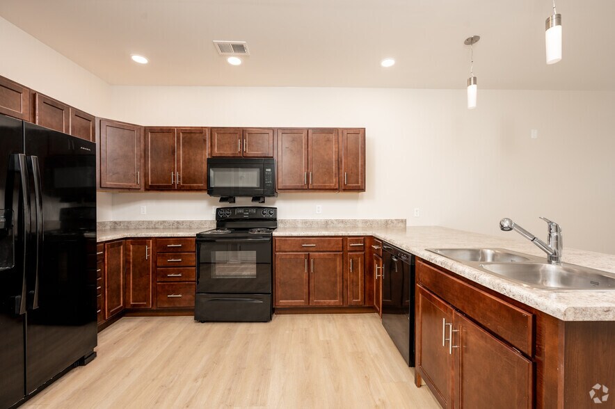 2BR, 2BA - 985SF - Kitchen - Founders Square Senior Apartments, LP