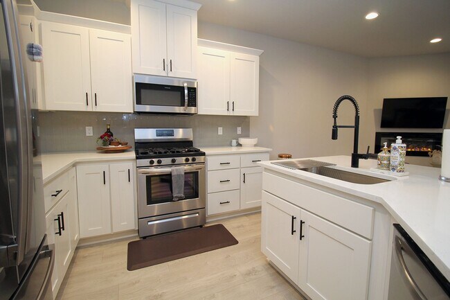 Building Photo - New Construction 3 Bedroom Townhome at Ple...