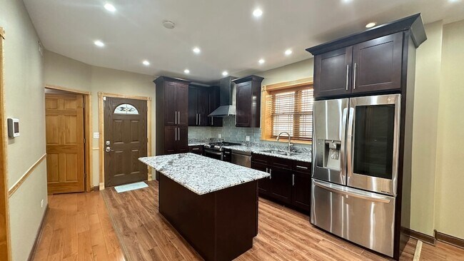 Building Photo - 5716 N Campbell Ave