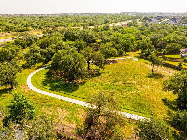 Building Photo - Stylish Corner Homesite on a Quiet Cul-de-...
