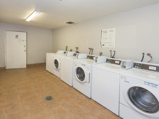 On-Site Laundry Center - The Hill Apartments