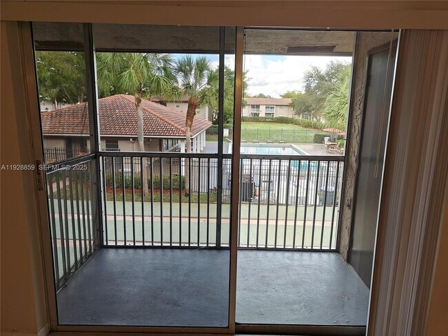 Building Photo - 8770 Royal Palm Blvd