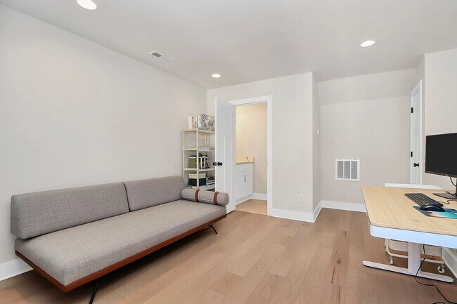 Building Photo - LoSo Terrace like new townhome available f...