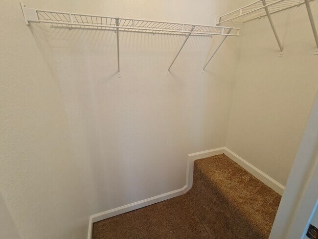 Building Photo - Spacious 2-Bed, 2.5-Bath Townhome with Gar...