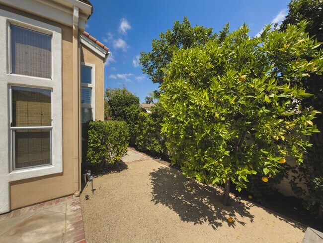 Building Photo - Elegant Mediterranean Living with Private Pergola Garden & Resort Amenities
