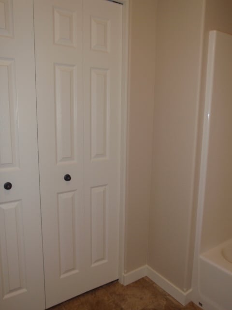 Building Photo - Newer house with attached garage. Half mon...