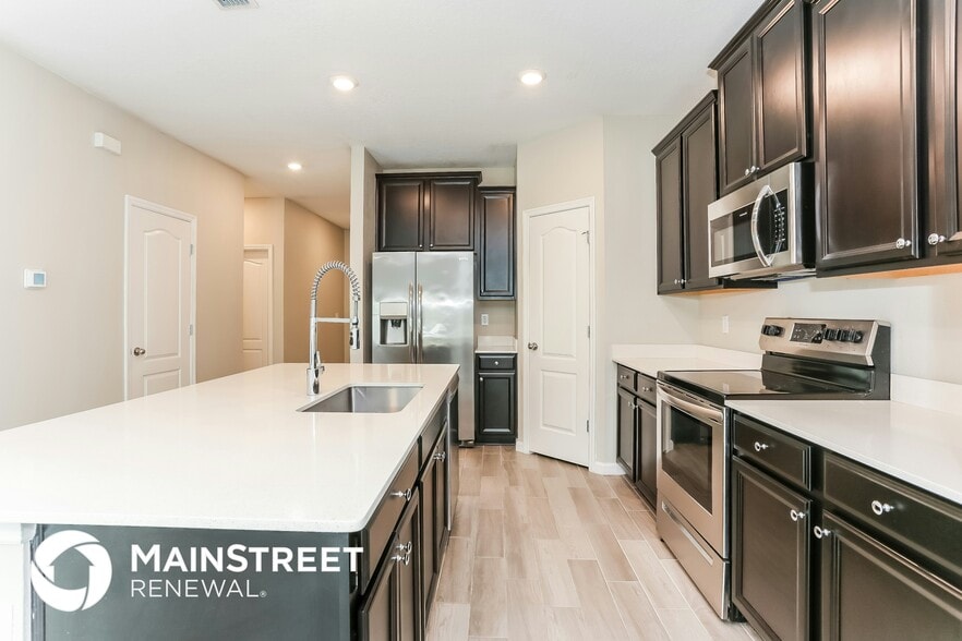 Building Photo - 9689 Lemon Grass Ln