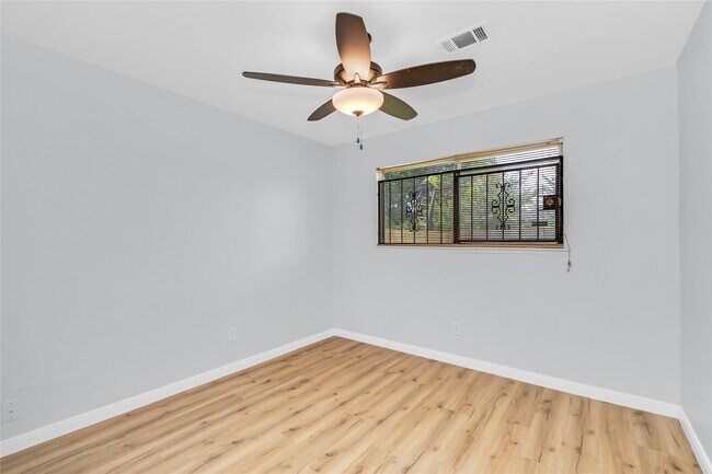 Building Photo - 11018 Long Gate Dr