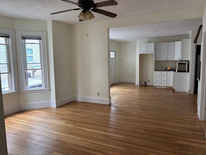 living room looking into kitchen - 113 Prospect St