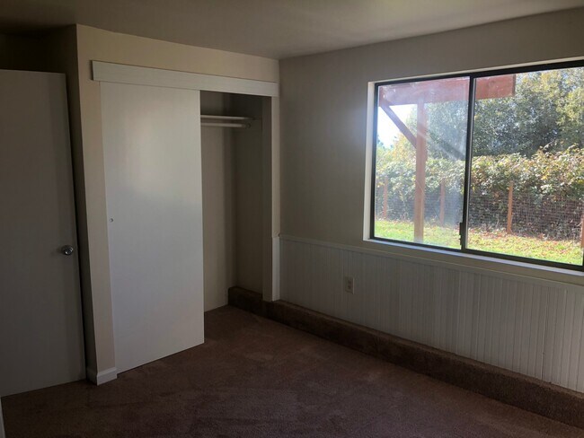 Building Photo - Charming 2 Bedroom, 2 Bonus Room Home with Beautiful Water view from Porch! Pets Negotiable!