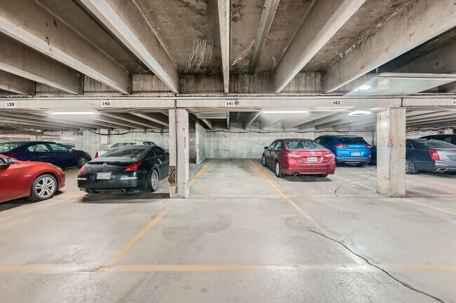 Building Photo - Completely Updated 2 Bedroom 2 Bathroom Condo Available NOW! Garage Parking Included!