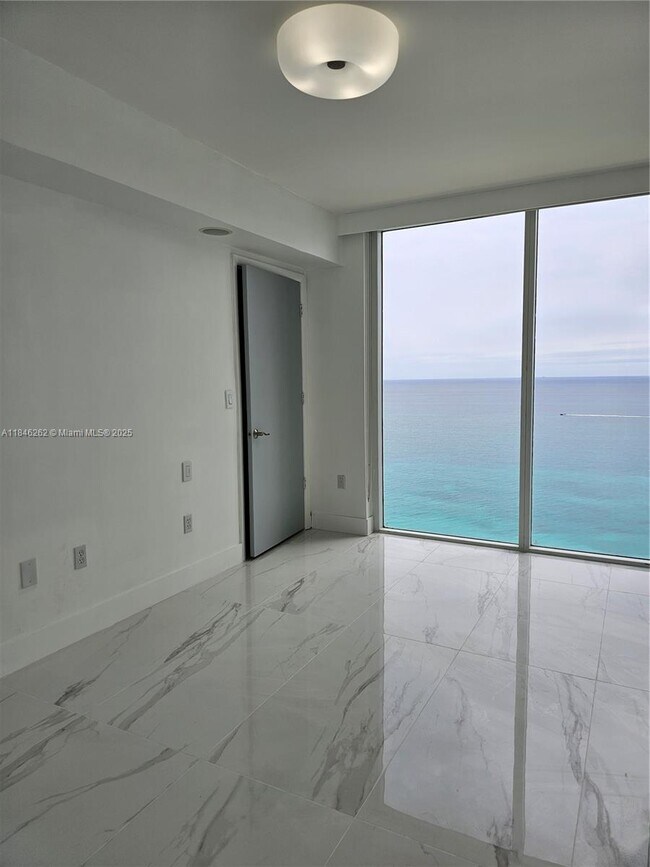 Building Photo - 19111 Collins Ave