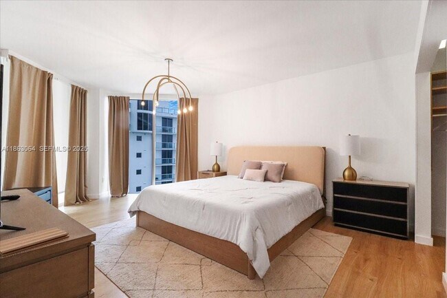 Building Photo - 18671 Collins Ave