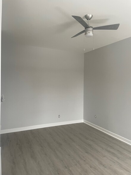 Living Room with Ceiling Fan - 216 Findlay St