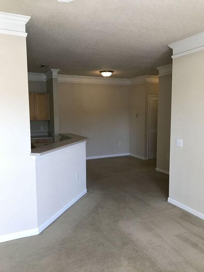 Building Photo - Just Listed!  2/2 Second Floor Unit Located at the Beautiful Mirabella Condominiums