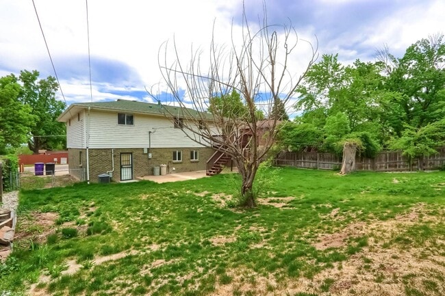Building Photo - 4 BED 3 BATH HOUSE NEAR CREAK PARK!!!