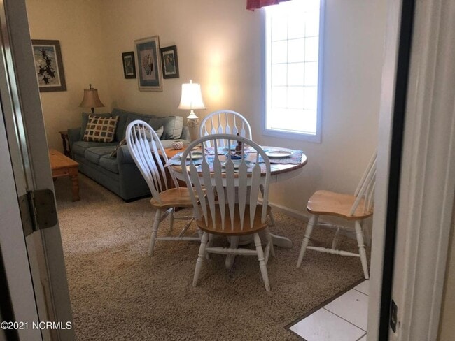 Building Photo - FULLY FURNISHED CONDO in sought-after Sea Trail subdivision!