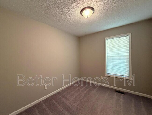 Building Photo - 5716 Woof Pl