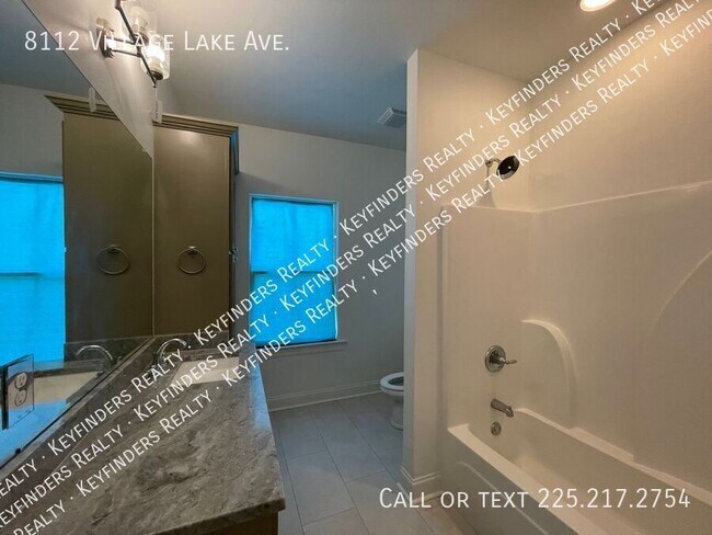Building Photo - 8112 Village Lake Ave