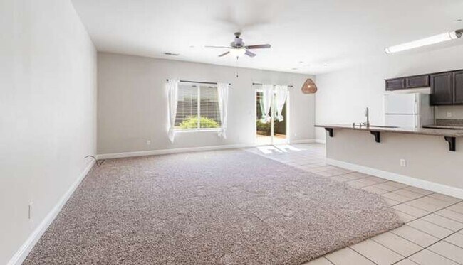 Building Photo - Four bedroom/2-bath home with 2-car garage