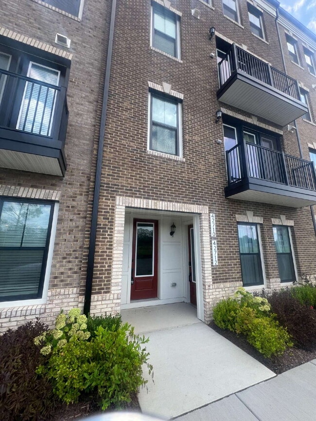 Building Photo - Brand-New Luxury 3BR Townhome-Style Condo ...